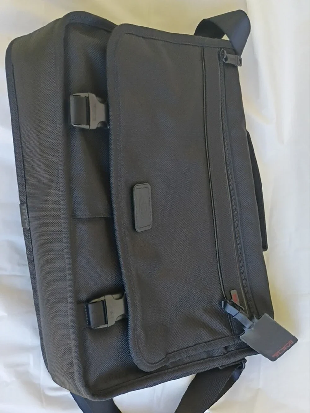 Tumi Black Nylon Messenger with Red Logo Accent